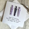 18th birthday card with candles in purple above scaled