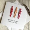 10th birthday card with candles in red above scaled