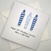 child birthday card with candles in blue above scaled